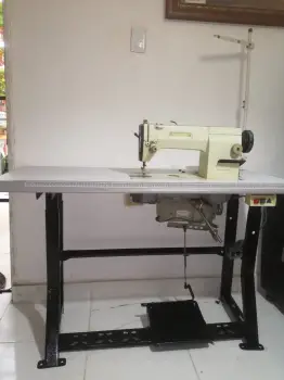 Maquina de coser como nueva  15500