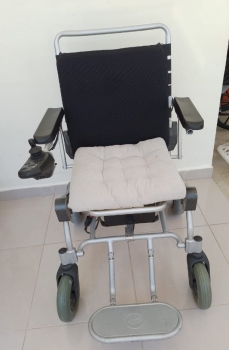 Silla de ruedas eléctrica  en la romana