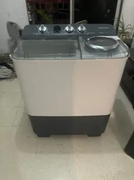 Por motivos de viaje vendo lavadora como nueva frigidaire super twin 9